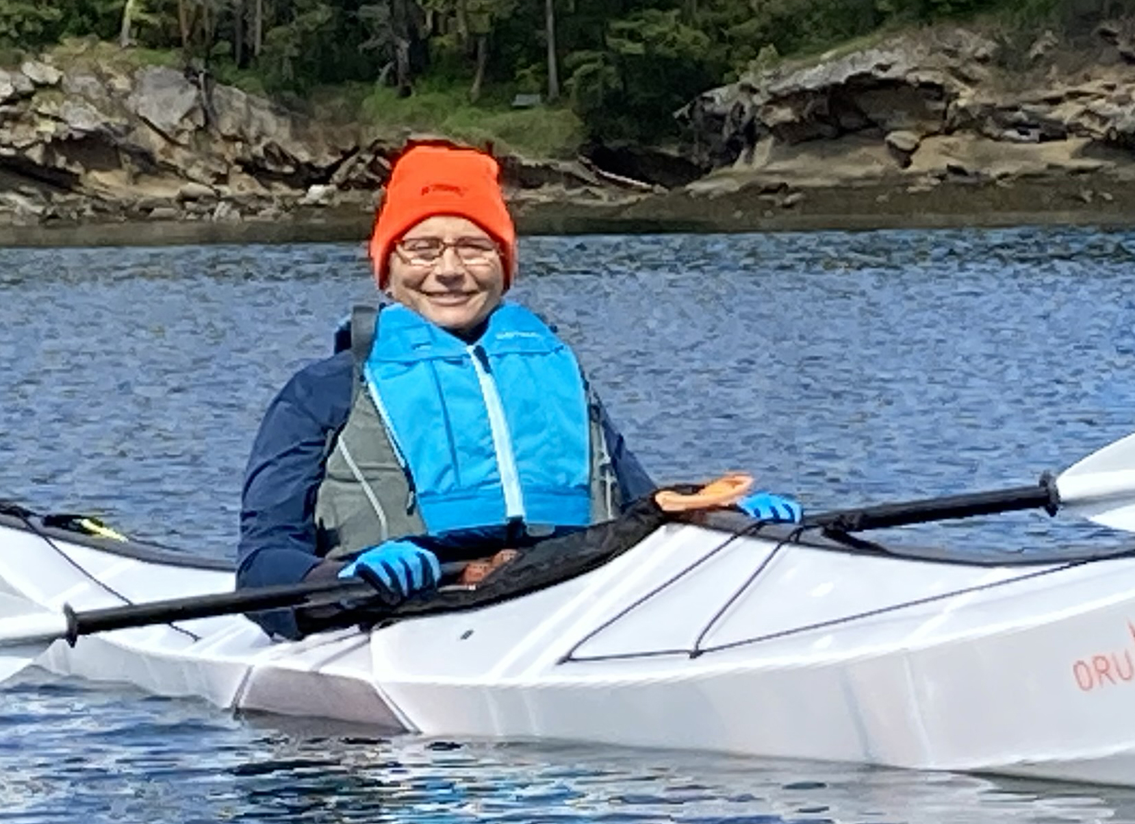 Julie in Oru folding kayak, Shallow Bay, Sucia Island, Wash.